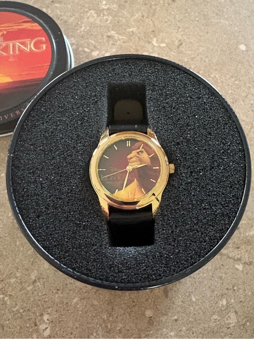 Gold-Tone Watch with Black Strap